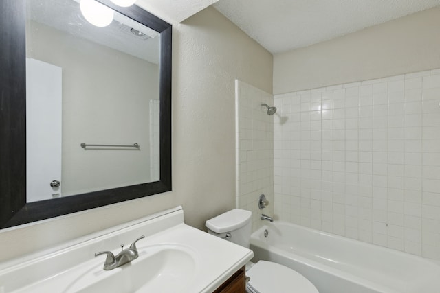 full bathroom with a textured wall, toilet, vanity, a textured ceiling, and shower / bathtub combination