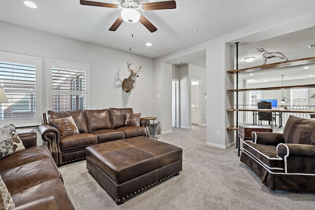 living room with light carpet, baseboards, a ceiling fan, and recessed lighting