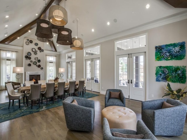 interior space with ornamental molding, french doors, and wood finished floors