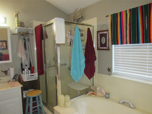 full bath with a garden tub, vanity, and a shower stall