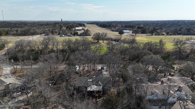 birds eye view of property featuring a rural view