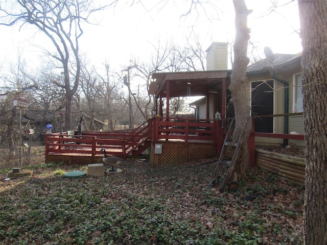 view of yard with a deck