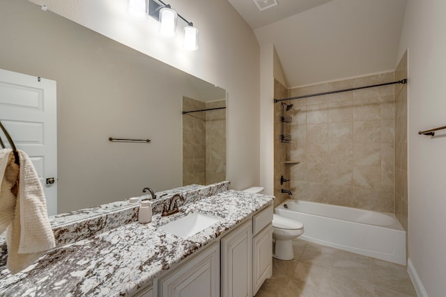 bathroom featuring tile patterned flooring, toilet, visible vents, vanity, and shower / bathing tub combination