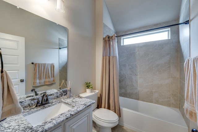 full bath featuring shower / tub combo, vanity, and toilet