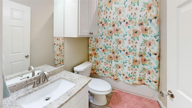 bathroom featuring toilet, shower / bathtub combination with curtain, and vanity