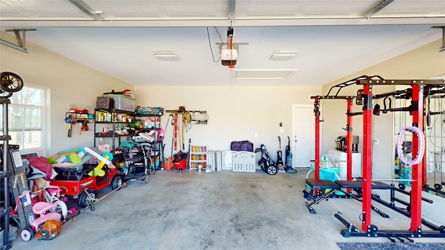 garage featuring a garage door opener