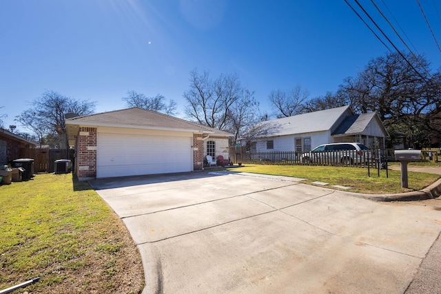 view of front facade featuring concrete driveway, a front yard, central AC, and brick siding