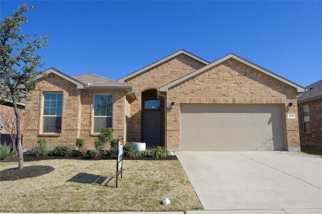 ranch-style home featuring concrete driveway, an attached garage, brick siding, and a front lawn