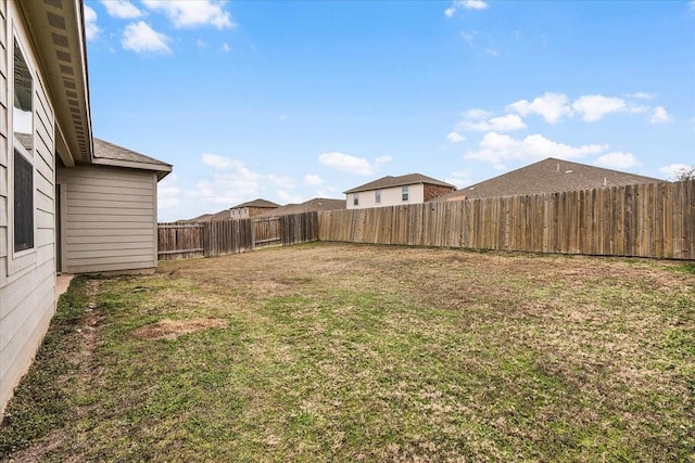 view of yard featuring a fenced backyard