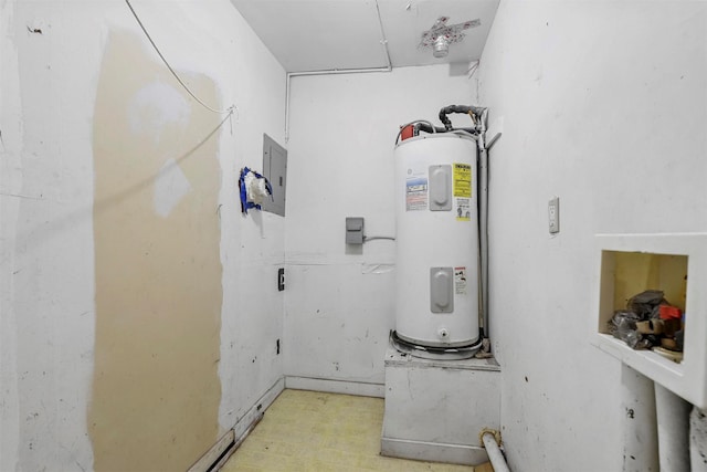 utility room featuring water heater