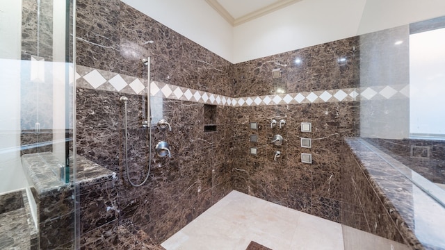 full bath with tiled shower and crown molding