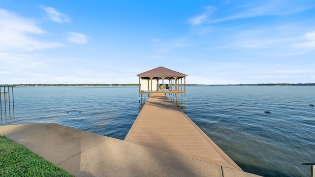 dock area with a water view