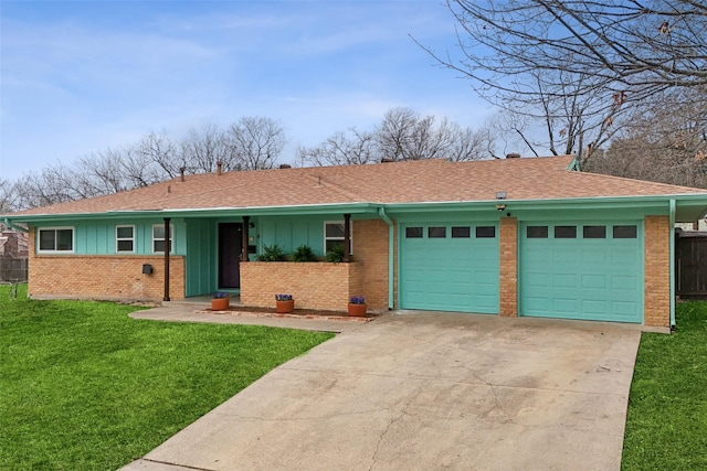 ranch-style home featuring a garage, brick siding, concrete driveway, board and batten siding, and a front yard