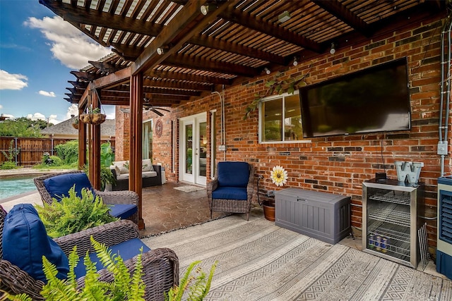 view of patio featuring an outdoor hangout area, fence, french doors, a fenced in pool, and a pergola