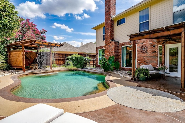 view of pool featuring a patio area, fence, and a fenced in pool