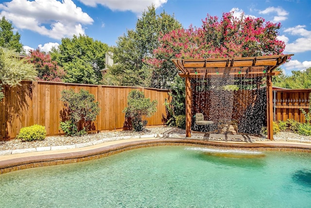 view of swimming pool featuring a fenced in pool and a fenced backyard