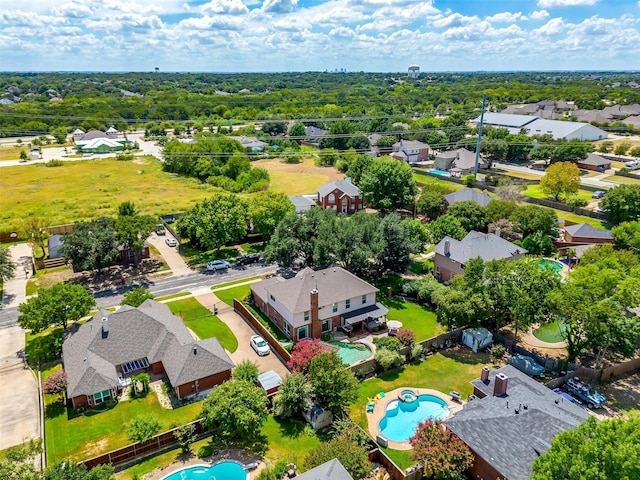 drone / aerial view with a residential view