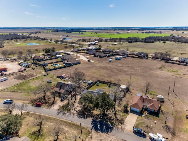 birds eye view of property featuring a rural view