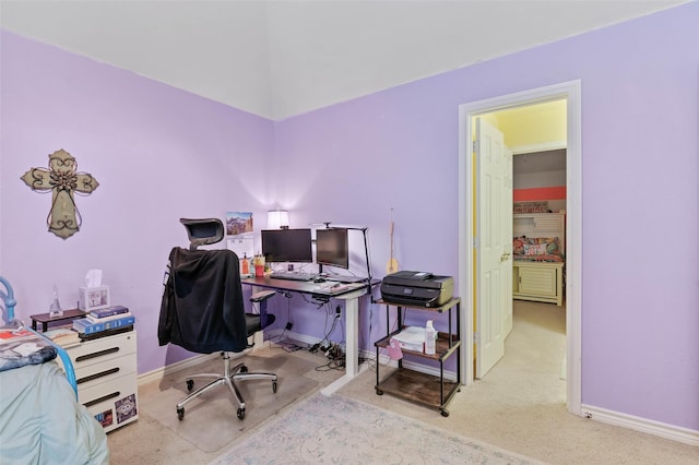 office featuring light carpet and baseboards