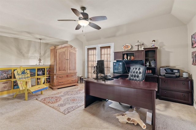 office featuring lofted ceiling, light colored carpet, and ceiling fan