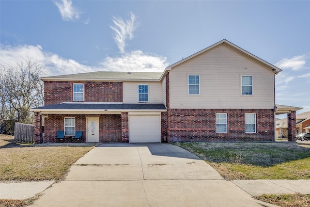 view of front of home with a garage, concrete driveway, brick siding, and a front lawn