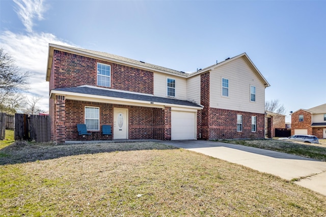 traditional-style home with driveway, fence, a front lawn, and brick siding