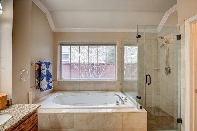 full bath featuring a garden tub, crown molding, vanity, and a shower stall