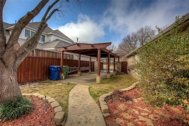 view of yard with a patio area and a fenced backyard