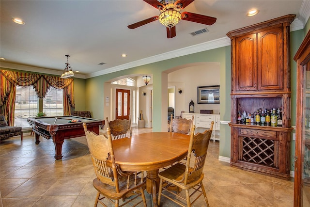 dining area with ornamental molding, arched walkways, visible vents, and recessed lighting