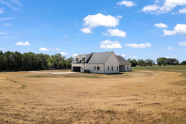 exterior space featuring a garage and driveway