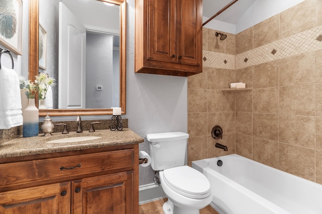 full bath featuring vaulted ceiling, shower / washtub combination, vanity, and toilet