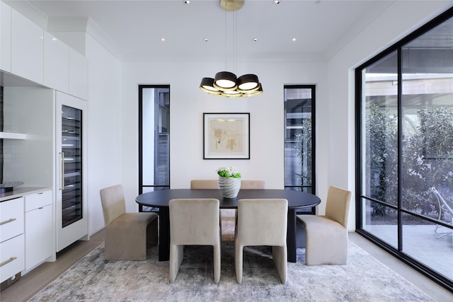 dining area featuring recessed lighting and a notable chandelier