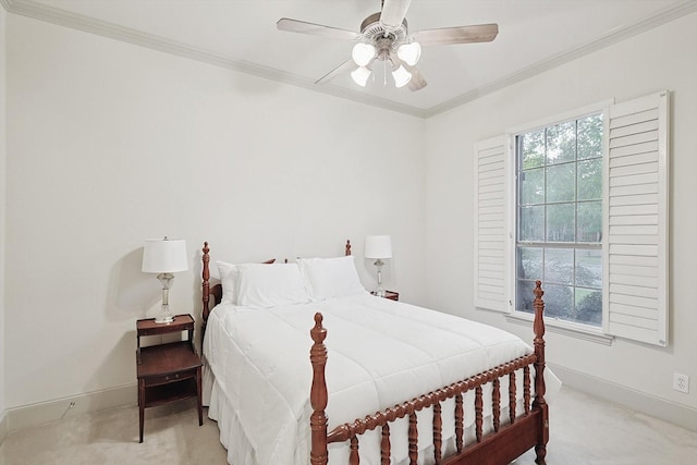 bedroom featuring light carpet, baseboards, and crown molding