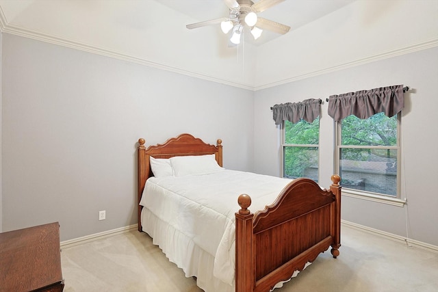 bedroom featuring light carpet, ceiling fan, and baseboards