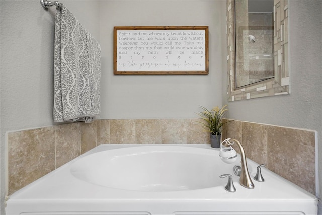 full bathroom featuring a garden tub