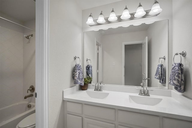 full bathroom with washtub / shower combination, a sink, toilet, and double vanity