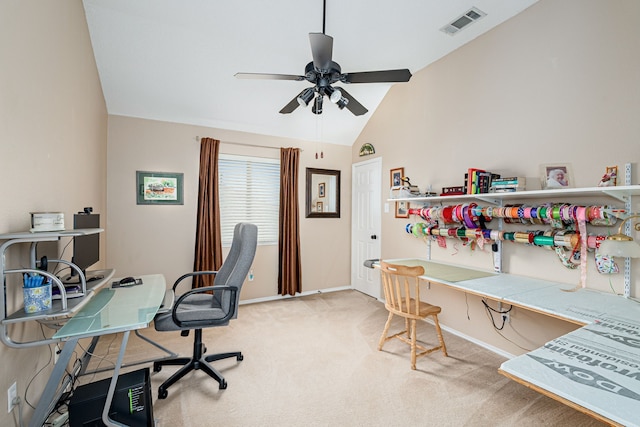 home office featuring baseboards, visible vents, a ceiling fan, carpet, and vaulted ceiling