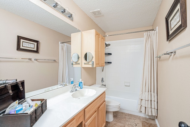 bathroom with a textured ceiling, toilet, vanity, visible vents, and shower / bathtub combination with curtain