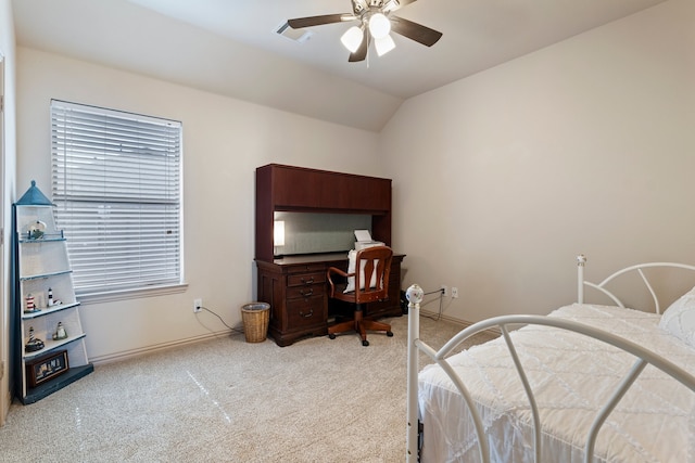 bedroom featuring baseboards, visible vents, a ceiling fan, light colored carpet, and vaulted ceiling