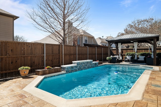 view of swimming pool with a gazebo, a patio, a fenced backyard, and a fenced in pool