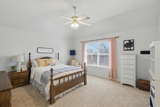 bedroom featuring light colored carpet, a ceiling fan, baseboards, vaulted ceiling, and visible vents