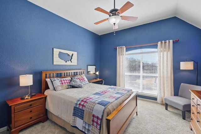 bedroom with light carpet, ceiling fan, and lofted ceiling