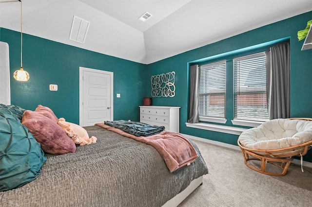 carpeted bedroom featuring visible vents, vaulted ceiling, and baseboards