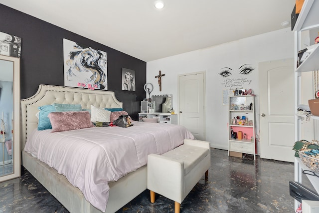 bedroom featuring finished concrete floors