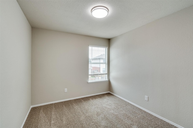 5700 Giddyup Ln, Fort Worth, TX 76179 - spare room featuring carpet floors and baseboards