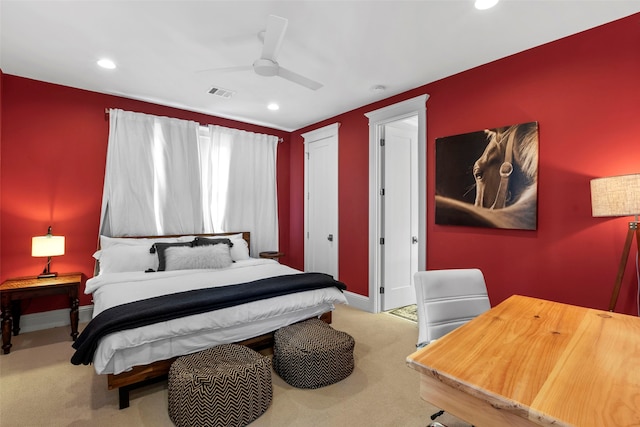 carpeted bedroom with ceiling fan, recessed lighting, visible vents, and baseboards