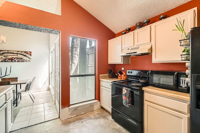 kitchen featuring lofted ceiling, light countertops, under cabinet range hood, and black appliances