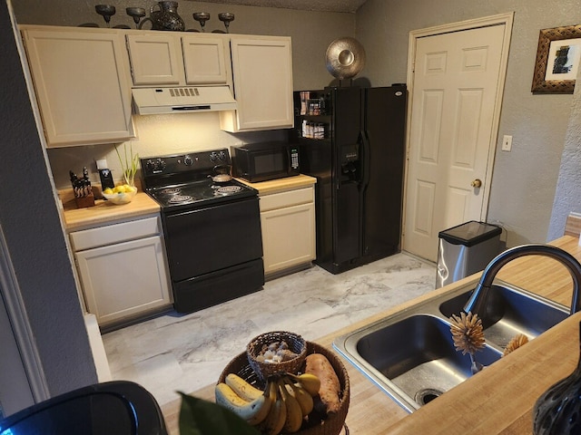 4727 Poppy Dr E, Fort Worth, TX 76137 - kitchen featuring black appliances, extractor fan, light countertops, a textured wall, and white cabinetry