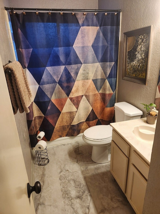 4727 Poppy Dr E, Fort Worth, TX 76137 - bathroom with vanity and a textured wall
