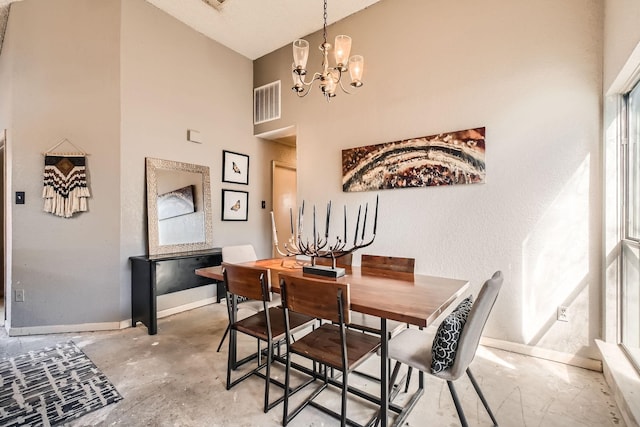 4727 Poppy Dr E, Fort Worth, TX 76137 - dining space featuring a high ceiling, a chandelier, and unfinished concrete flooring